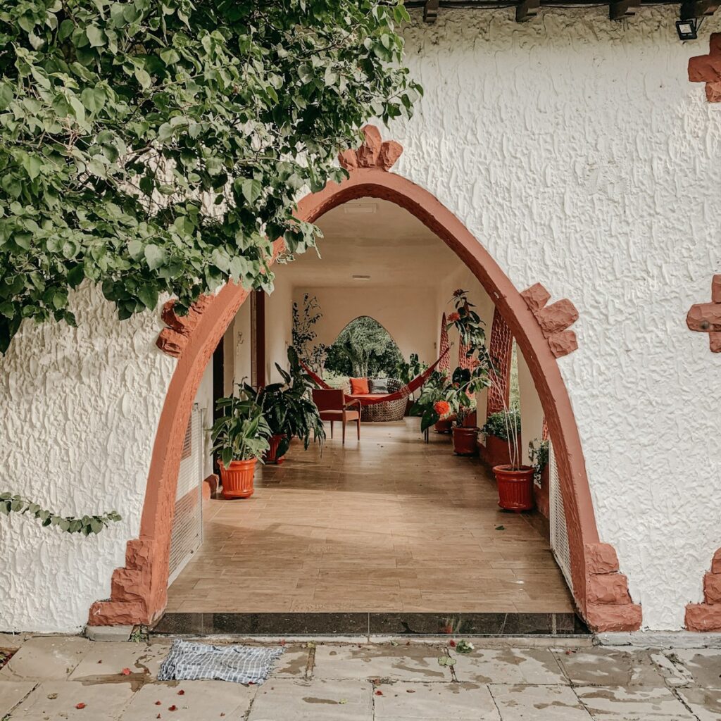 white and brown concrete house alley